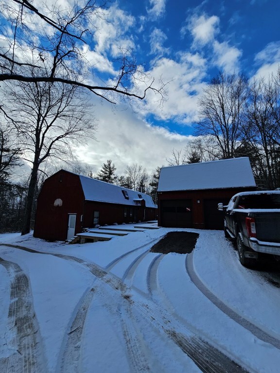 exterior space with an outbuilding