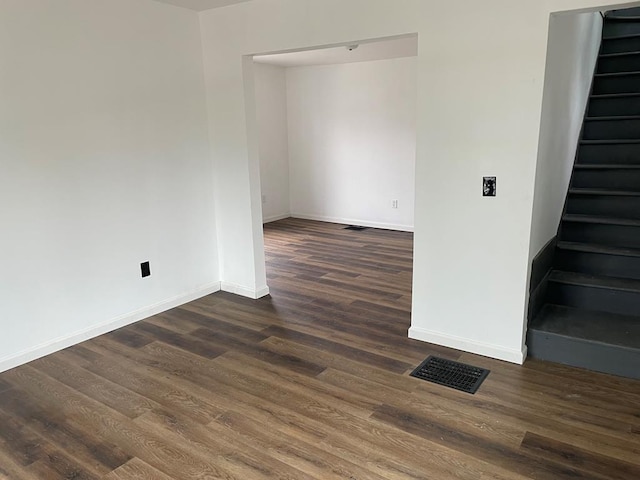 350 E High St, Erwin, NY 14870 - spare room with stairs and dark wood-style flooring