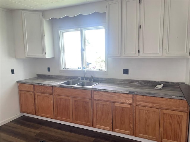 350 E High St, Erwin, NY 14870 - kitchen with dark wood finished floors, brown cabinets, and white cabinets