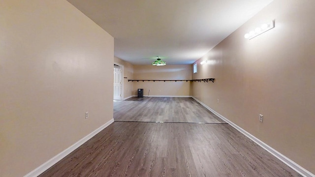 11827 Lando Ln, Corning, NY 14830 - below grade area with baseboards and wood finished floors
