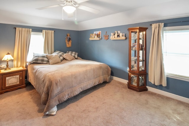 bedroom featuring ceiling fan and carpet floors