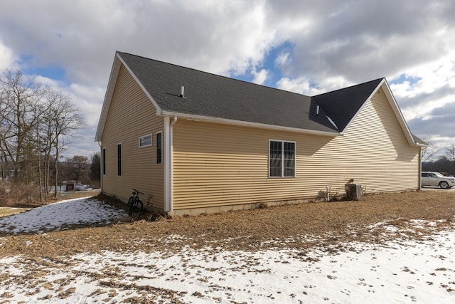 view of snow covered property