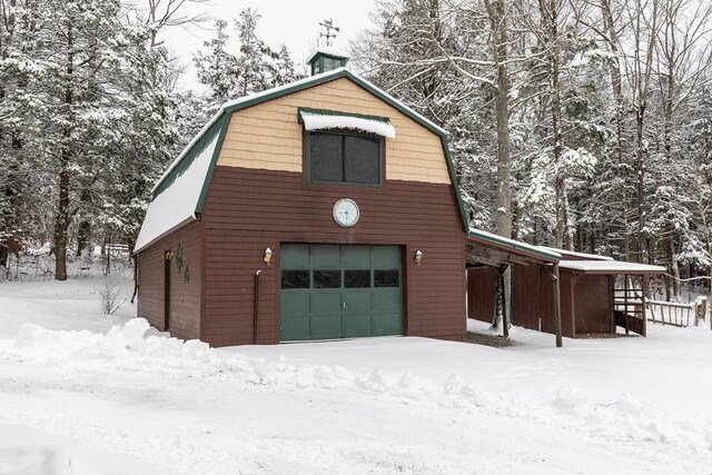 view of snow covered garage