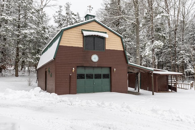 view of snow covered garage