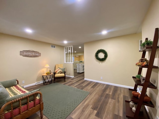 living area with dark wood-type flooring