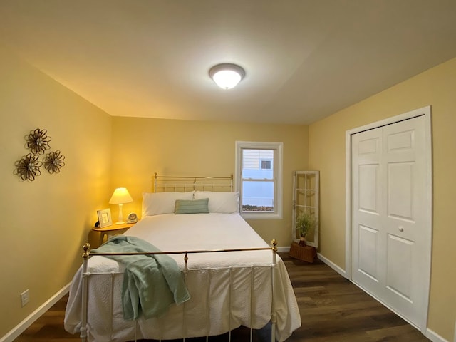 bedroom featuring dark hardwood / wood-style floors