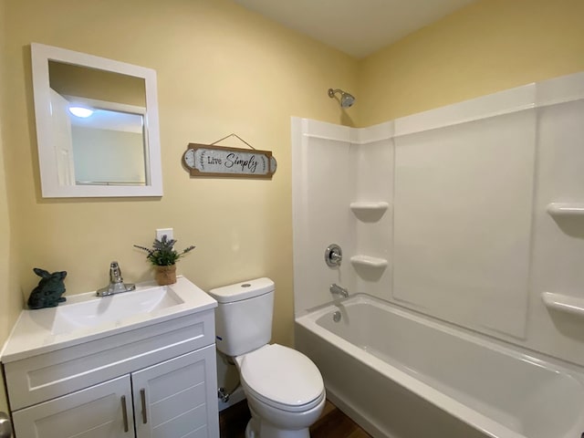 full bathroom featuring vanity, toilet, and washtub / shower combination