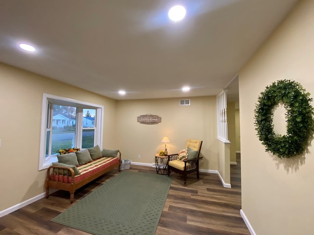 living room with dark hardwood / wood-style floors