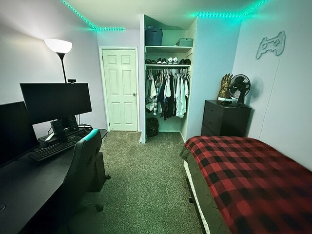 carpeted bedroom with a closet