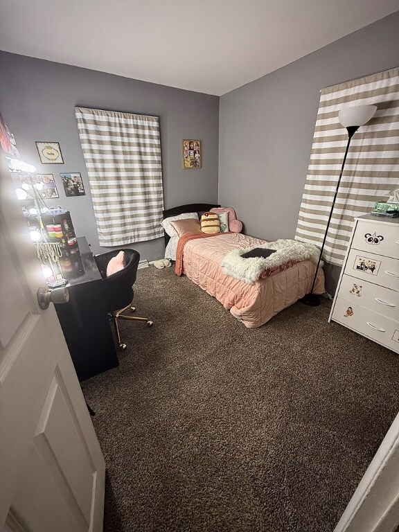 bedroom featuring carpet