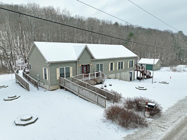 view of snow covered house