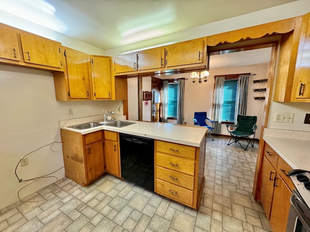 kitchen featuring dishwasher, sink, and kitchen peninsula