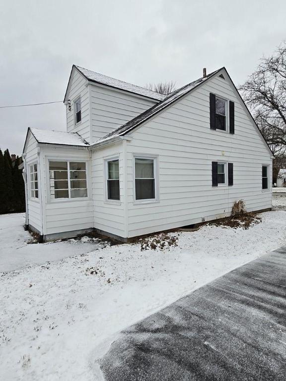 view of snow covered property