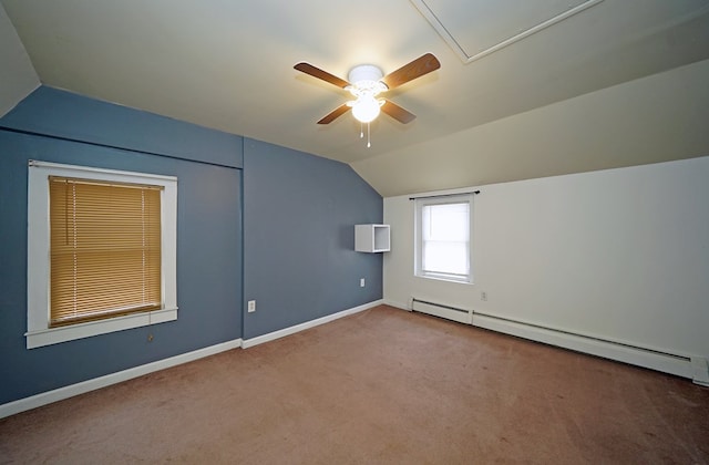 bonus room with a baseboard radiator, vaulted ceiling, and carpet