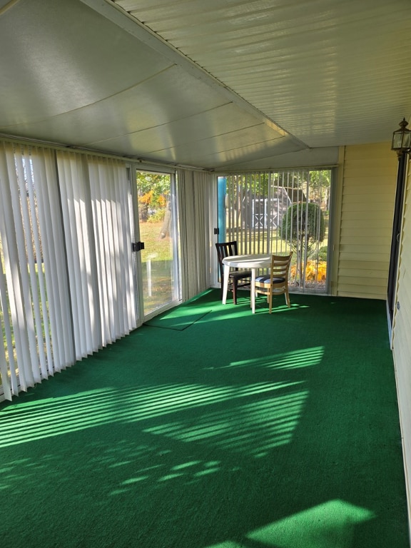 unfurnished sunroom with plenty of natural light