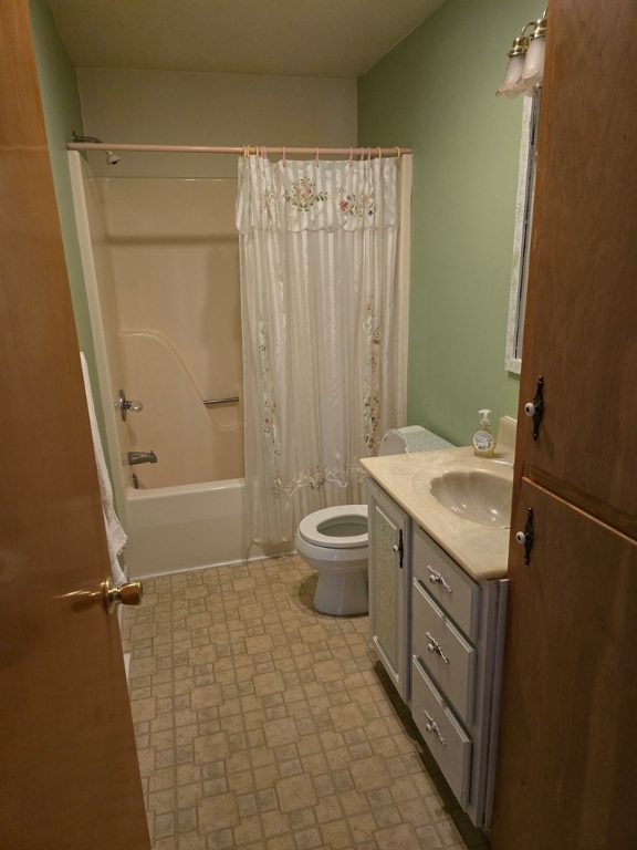 full bathroom featuring vanity, toilet, and shower / tub combo