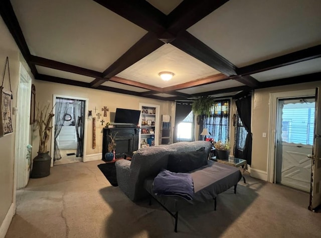 bedroom with coffered ceiling, light colored carpet, and beam ceiling