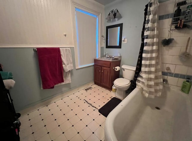 full bathroom with vanity, toilet, and shower / bathtub combination with curtain