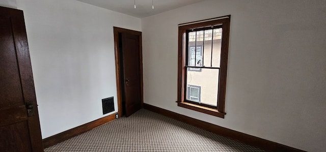 hallway featuring carpet flooring