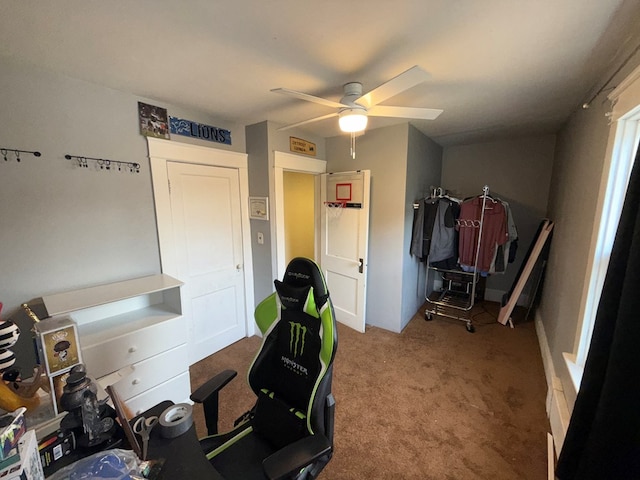 office with ceiling fan and carpet flooring