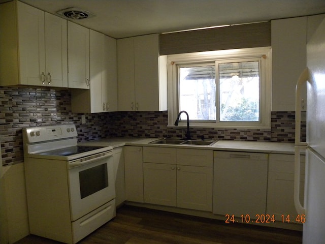 759 Main St, Chemung, NY 14825 - kitchen with sink, white appliances, dark wood-type flooring, white cabinetry, and backsplash
