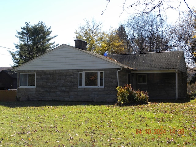 759 Main St, Chemung, NY 14825 - back of house featuring a yard
