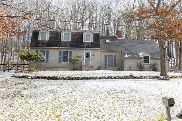 view of new england style home