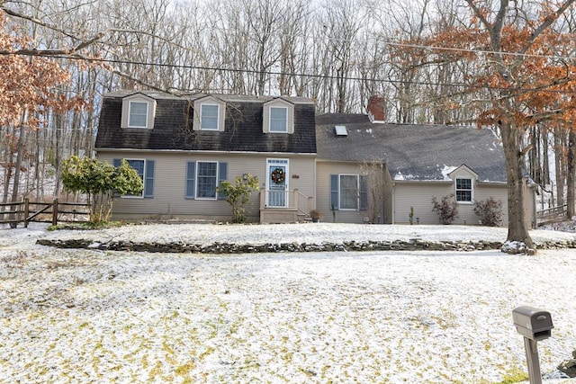 view of new england style home