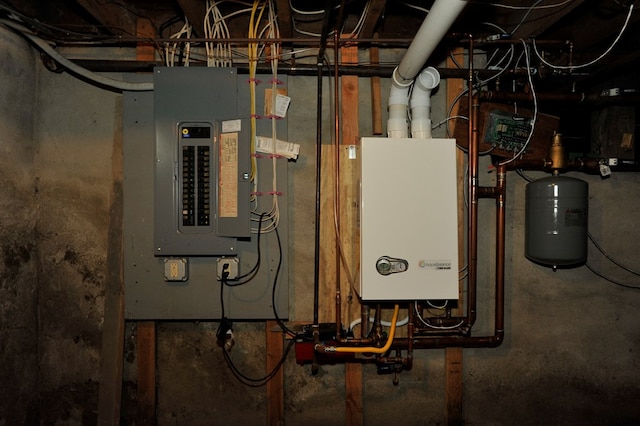 utilities featuring tankless water heater and electric panel