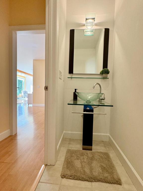 bathroom featuring sink and hardwood / wood-style floors