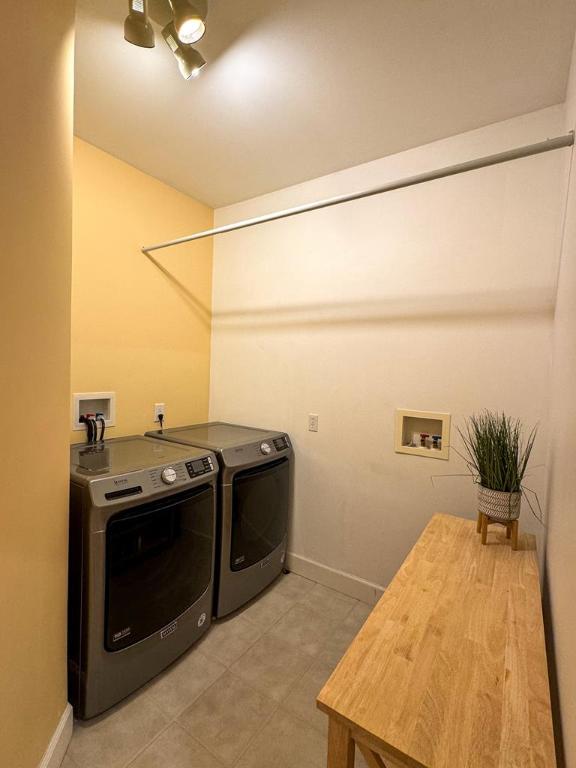 laundry area with washer and dryer