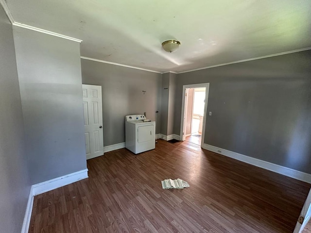 unfurnished bedroom featuring hardwood / wood-style flooring, ornamental molding, and washer / dryer