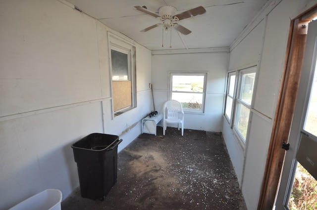 sunroom / solarium with ceiling fan