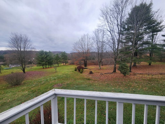 view of yard with a rural view