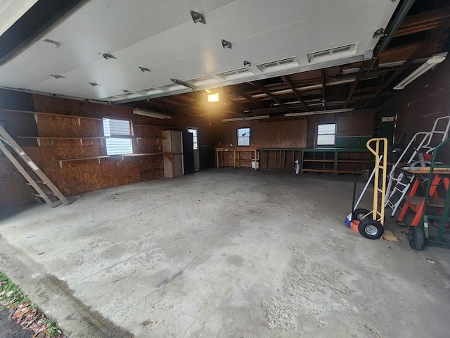 garage featuring fridge