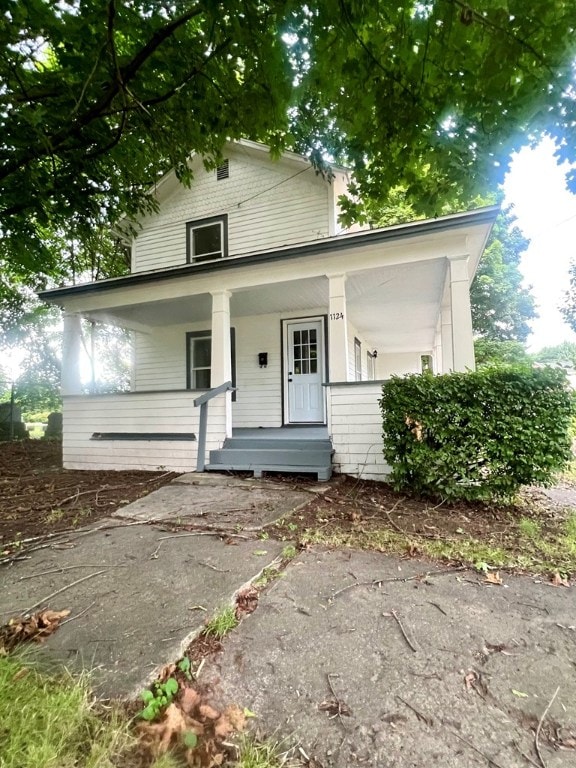 view of front of house with covered porch