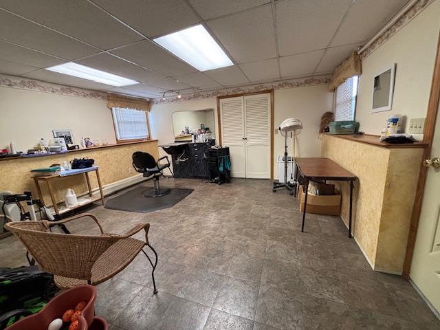 interior space featuring a paneled ceiling