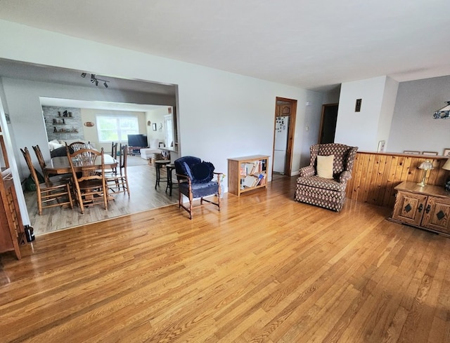 living area with wood finished floors