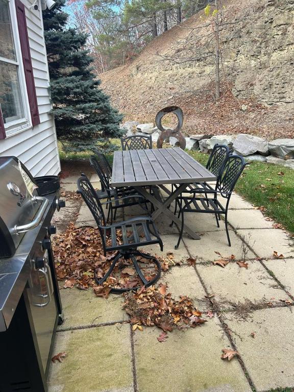 view of patio with a grill