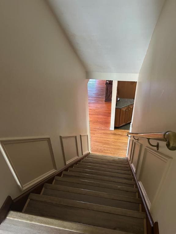 staircase featuring hardwood / wood-style floors