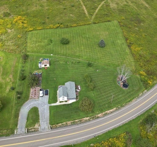 aerial view featuring a rural view