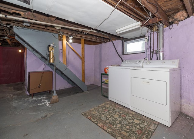 basement with washing machine and dryer