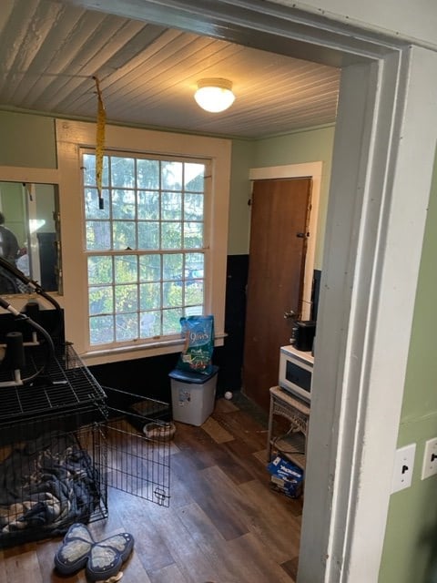 miscellaneous room featuring hardwood / wood-style flooring and wooden ceiling