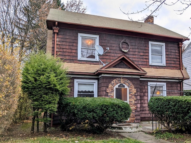 view of front of property featuring a chimney