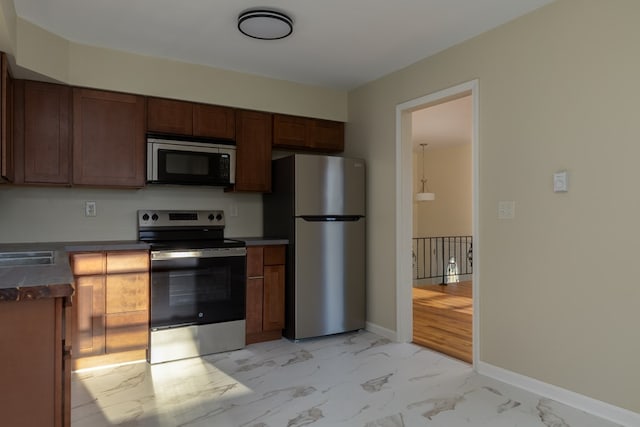 kitchen with stainless steel appliances and sink