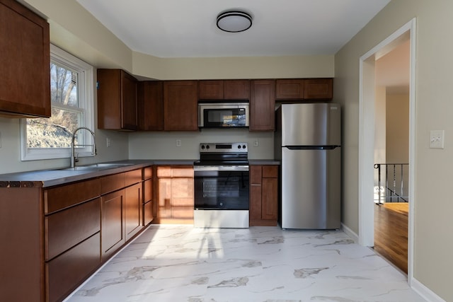 kitchen with stainless steel appliances and sink