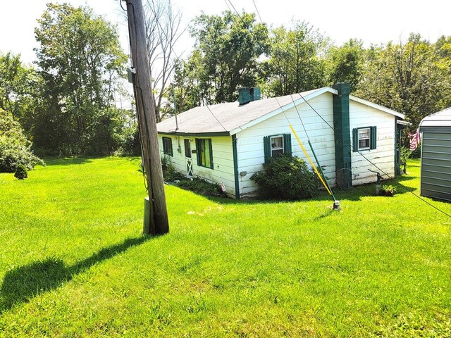 exterior space with a yard