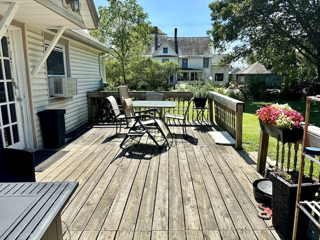 deck with cooling unit and a yard