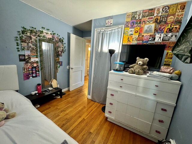 bedroom featuring light hardwood / wood-style floors