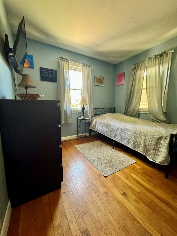 bedroom featuring hardwood / wood-style floors